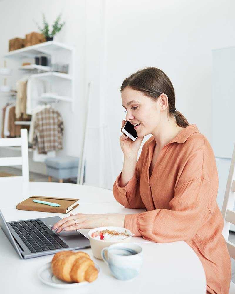 businesswoman-working-at-home-9FFK38F.jpg
